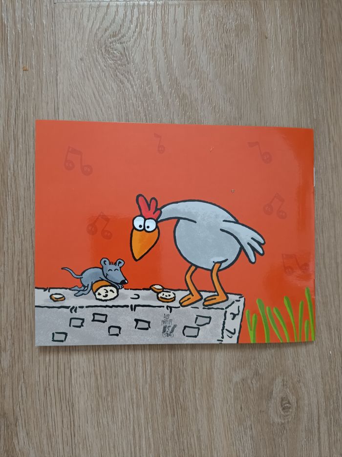 Livre une poule sur un mur et autres comptines - photo numéro 2
