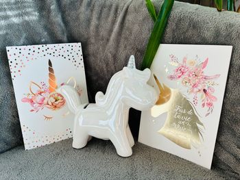 Lot tirelire et carnets licorne