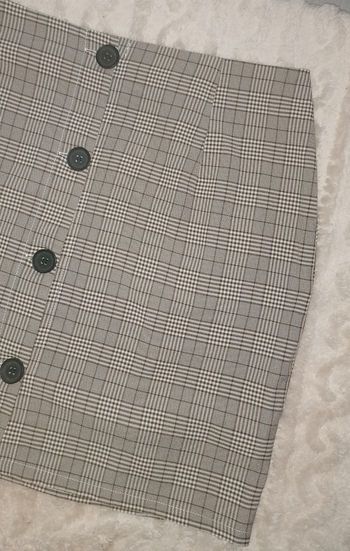 Jupe courte à boutons 42