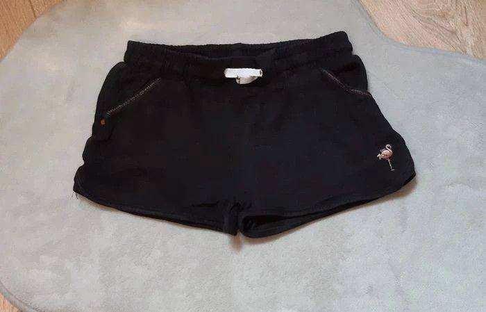 Short orchestra noir flamand rose "doré " 8 ans en parfait état