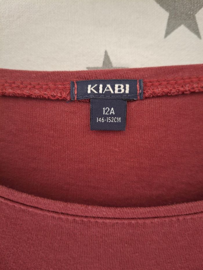 Tee-shirt manches longues bordeaux 12 ans Kiabi
Très bon état ni trous ni tache - photo numéro 4