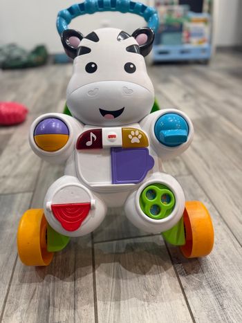 Trotteur bébé musique