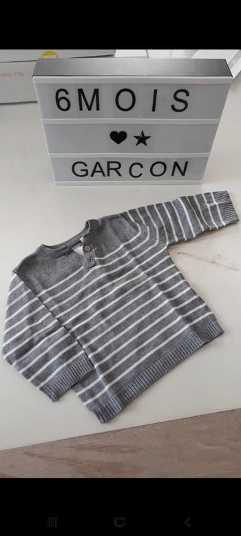 Pull gris rayé