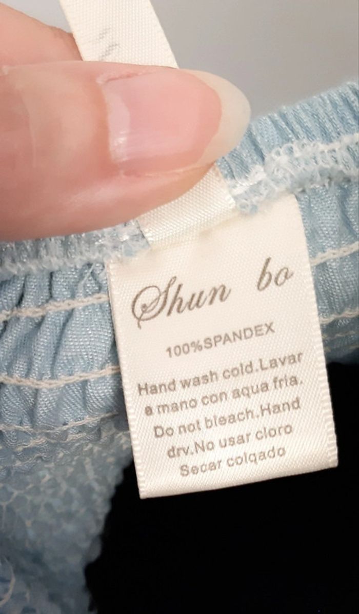 Très joli top dos et épaules dénudés couleur jean avec gros strass Shun bo - photo numéro 13