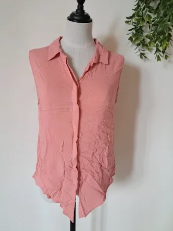 Chemisier sans manches rose poudré tendance