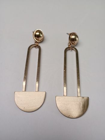 Boucles d'oreilles longues dorées