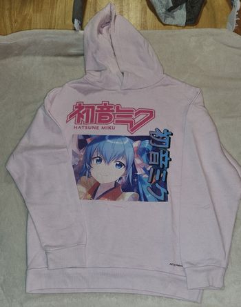 Pull rose fille