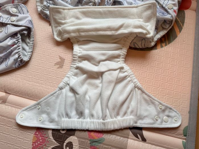 11 couches lavables Pampers dont 7 neuves