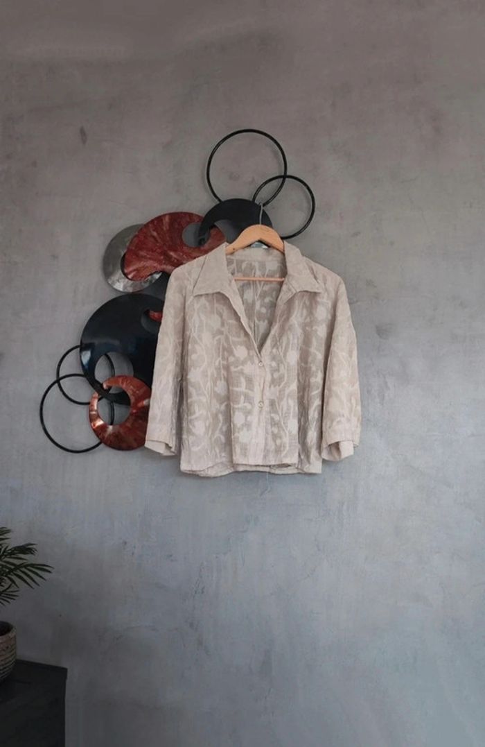 Blouse beige à motifs