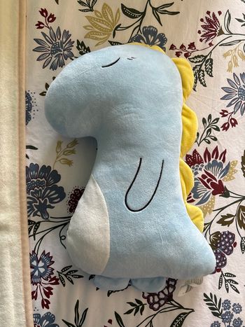 Peluche coussin dinosaure