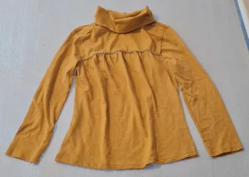 Pull col roulé
