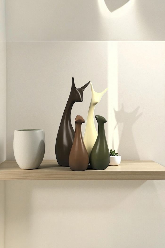 Lot de 4 statuettes décoratives cerfs en résine - Neuves