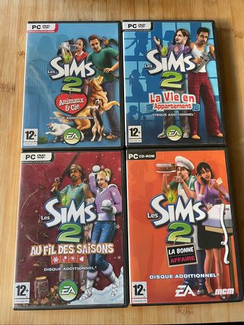 🎮 Lot 4 extensions officielles Les Sims 2 – PC / EA Games