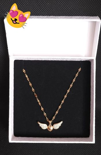 Collier doré coeur ailles