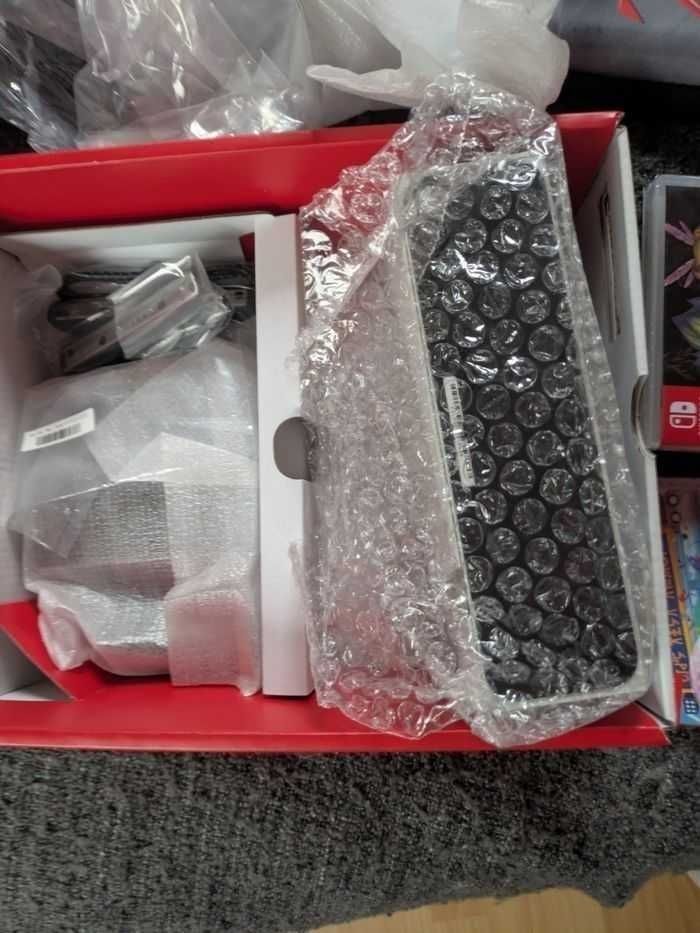 Nintendo Switch Modèle OLED HEG-001 64Go - Blanc + 4 Jeux Et une Housse Zelda - photo numéro 5