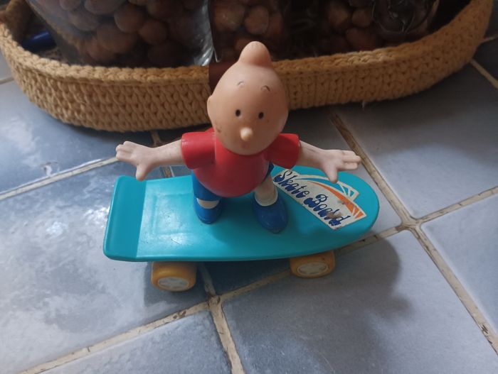 Tintin sur planche a roulettes a friction.. vintage.collector - photo numéro 2