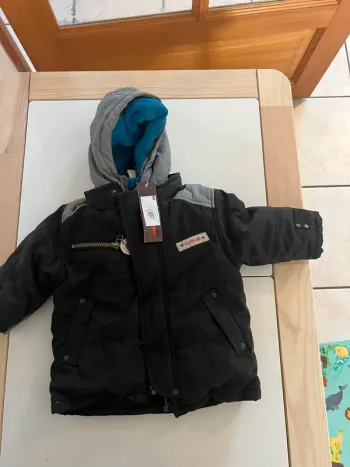 Doudoune Catimini 6 mois, neuve avec étiquette.
