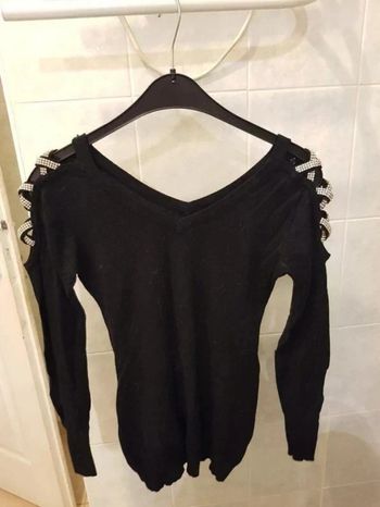 Pull. Femme. Taille unique. starss manches 60 cm .longueur 65 cm.