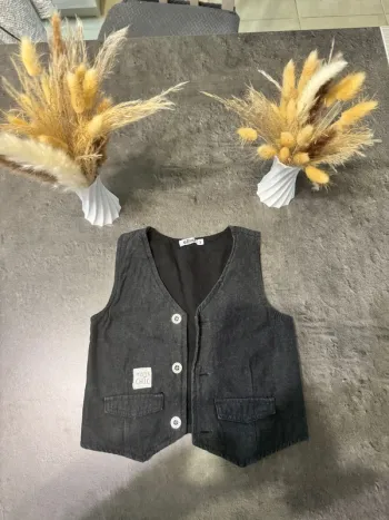 Boléro sans manches garçon