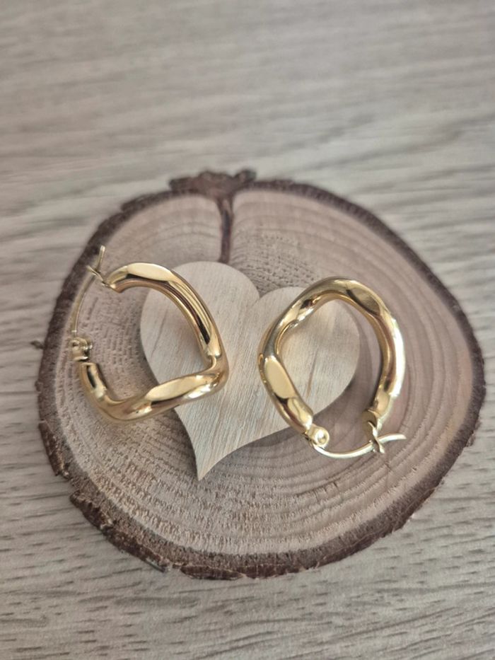 Jolie boucle d'oreilles torsadé en acier - photo numéro 3