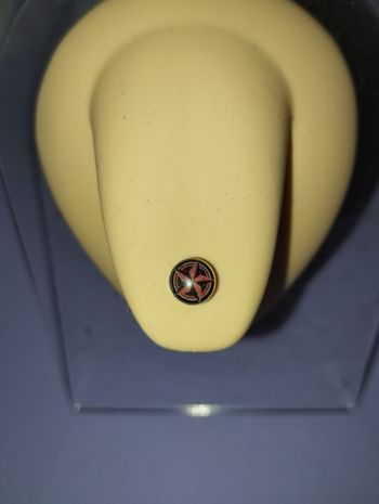 Piercing langue etoile