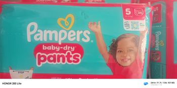 Coche pampers tout neuf 