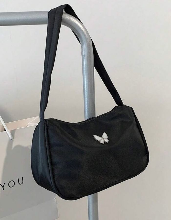 Sac à main noir avec un ornement papillon blanc - photo numéro 2