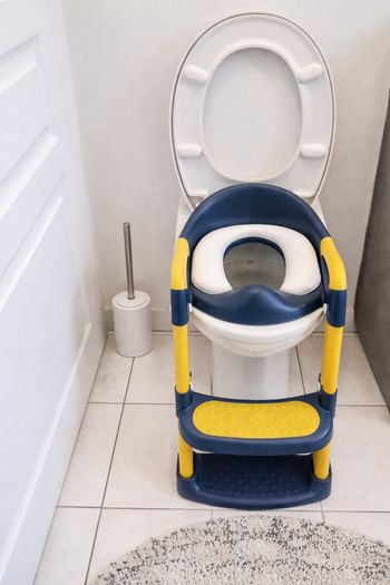 Réducteur de WC avec marche