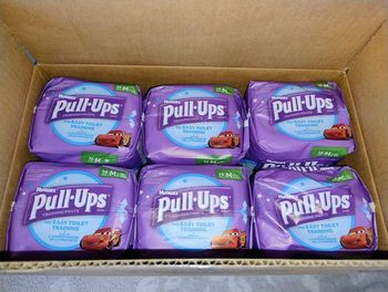 Lot de couches culottes d'apprentissage huggies pull ups taille M