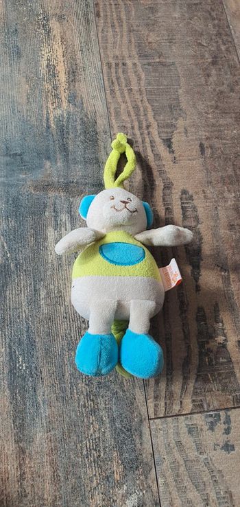 Peluche ours musical vert bleu et blanc Jouer avec les Maternelles