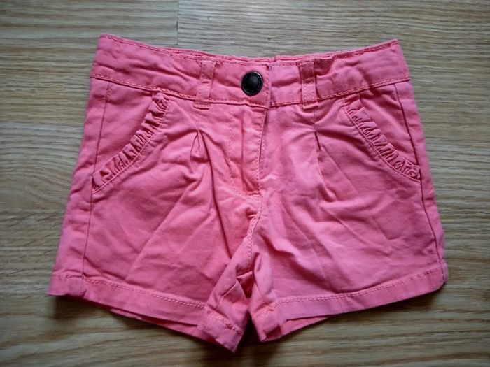 Short rose saumon. Orchestra.
Taille 3 ans