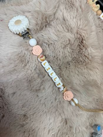 Attache tétine fleur 