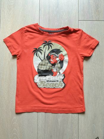 Maillot manche courte orange. Garçon 6 ans. Marque Kiabi