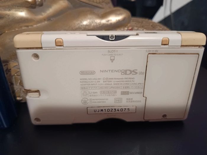 Lot 2 Ds Lite vendu pour pièces ne s'allume pas et ne connait pas la panne - photo numéro 7