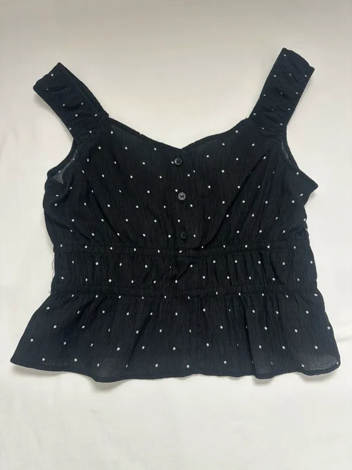 DébardeDébardeur H&M noir à pois blancs – Taille 158