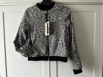 Très belle veste Ikks junior réversible