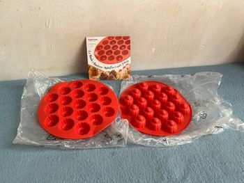 Lot de 2 moules à bouchées Tupperware neufs avec livret recettes tupperchef silicone forms