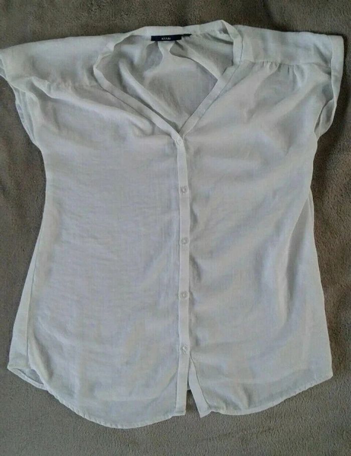 Chemise legere femme blanche sans
manches Kiabi taille S