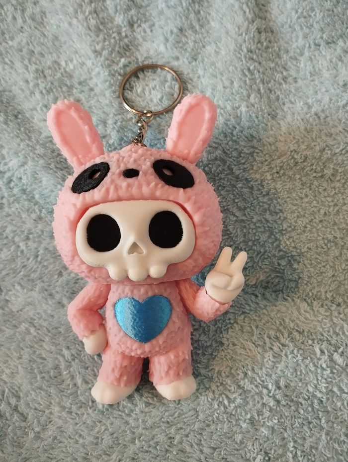 Figurine lapin skull porte clé