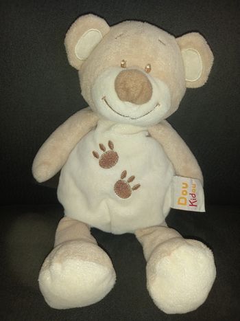 Doudou peluche ourson beige comme neuf marque doukidou