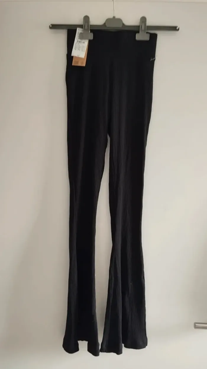 Pantalon noir patte d éléphant taille xxs kiabi - photo numéro 2