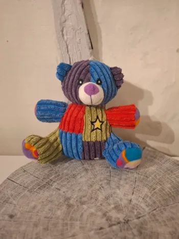 Peluche Doudou ours multicolore
