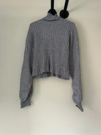 Pull col roulé