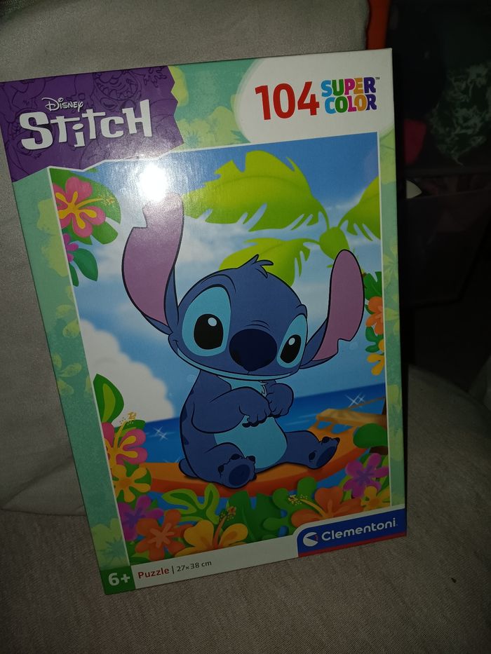 Puzzle 104 pièces stitch neuf