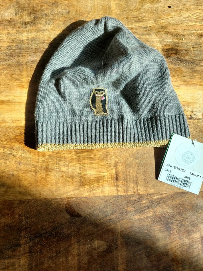 Bonnet gris et dorée taille 1