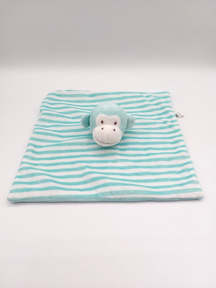 Doudou plat singe bleu blanc ESPA INTERCOMMERCE Shenzen rayures proche du neuf - photo numéro 1