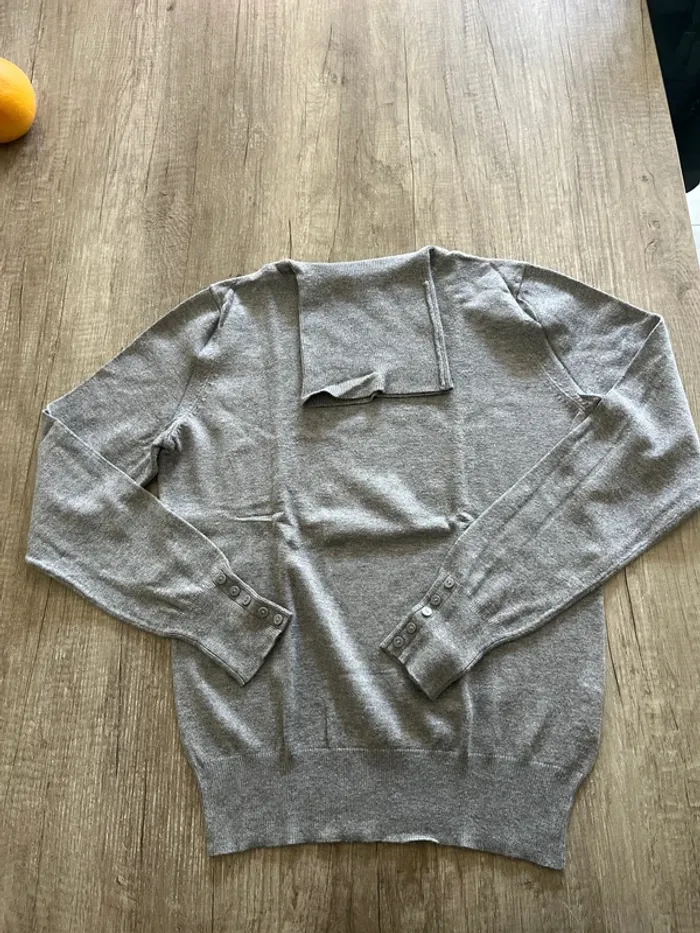 Pull col roulé