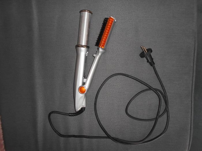 Fer à coiffer rotatif (Instyler)