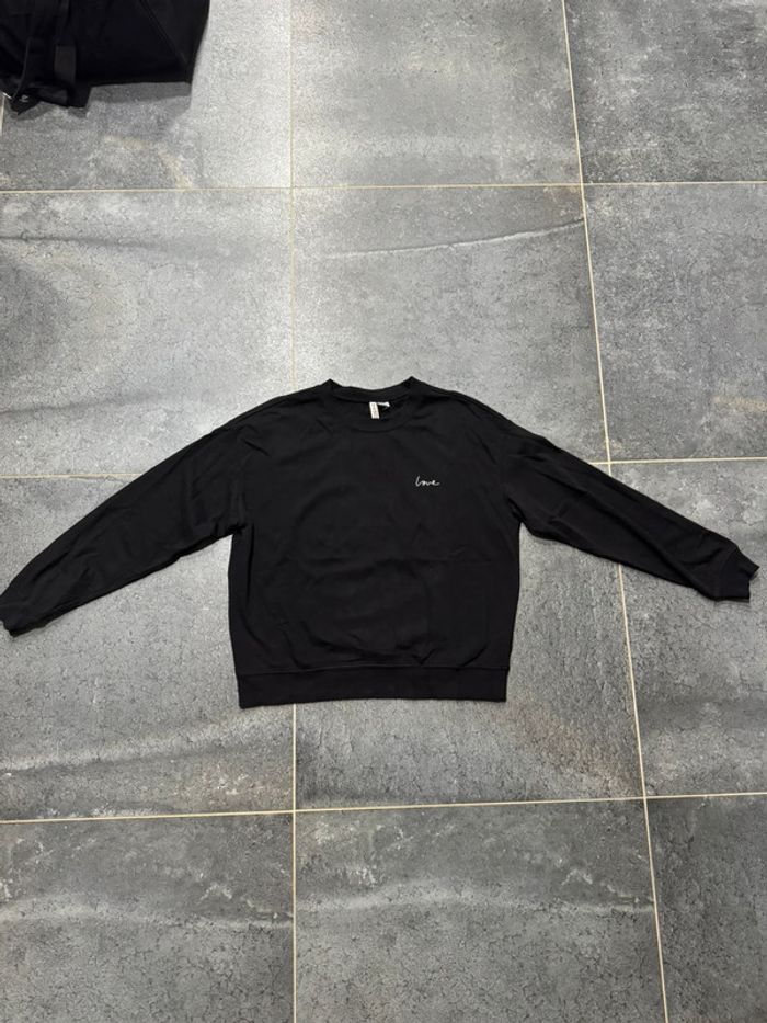 Pull noir femme
