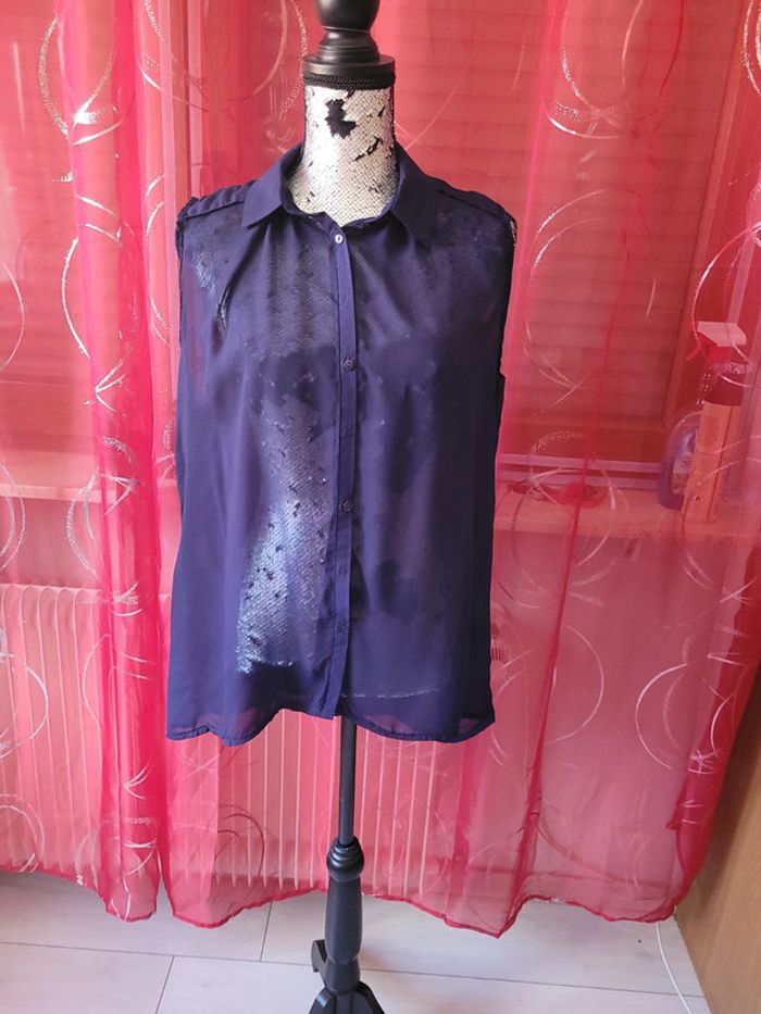 Chemise sans manches transparente